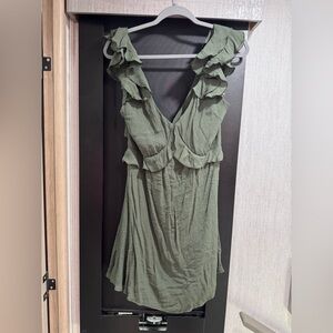 Francesca’s green mini dress